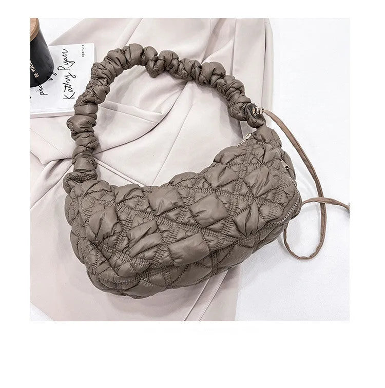Women's casual nylon shoulder messenger bag in a solid colour with an adjustable long strap.