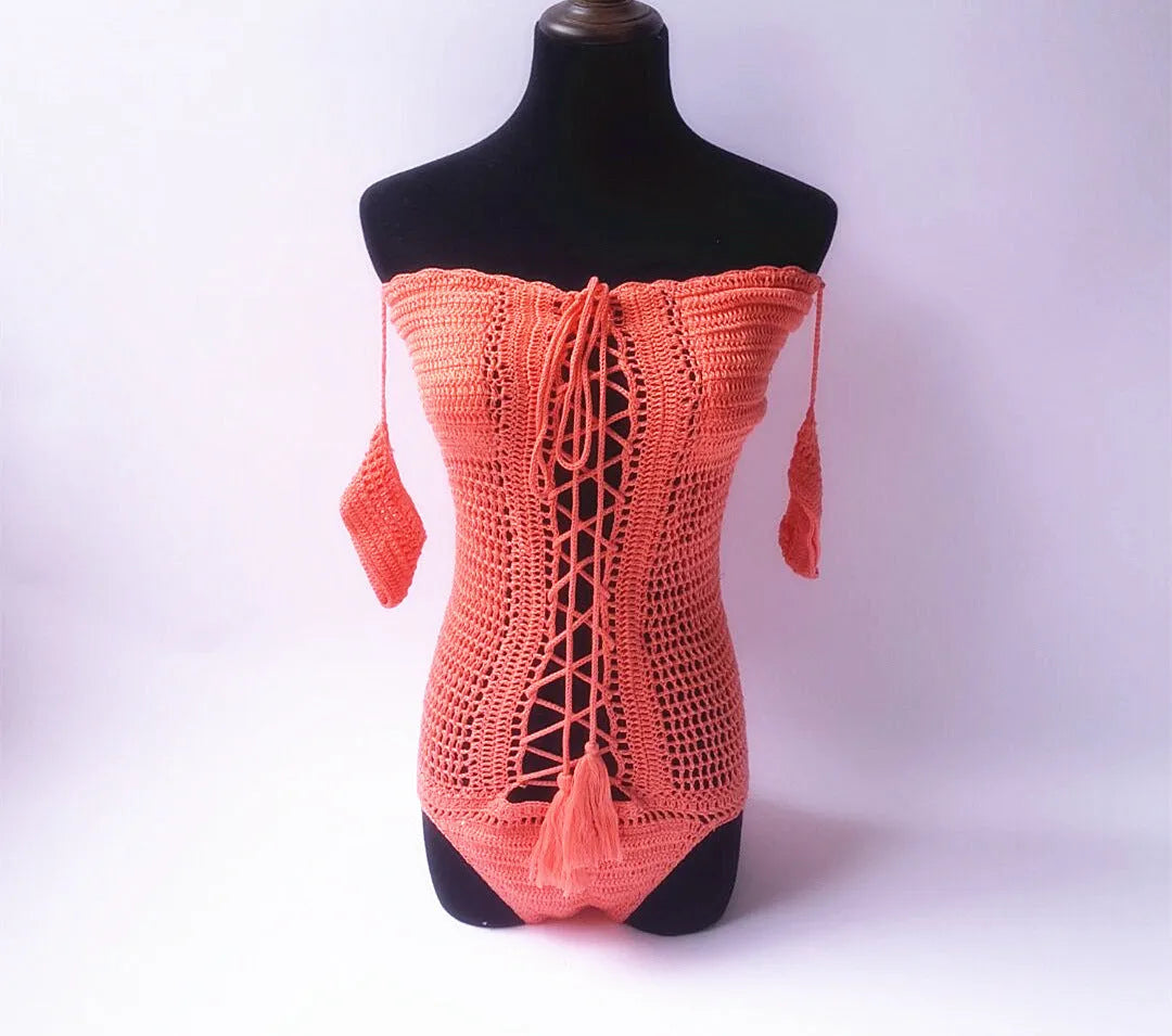 Off-shoulder one-piece swimsuit in light pink on a mannequin