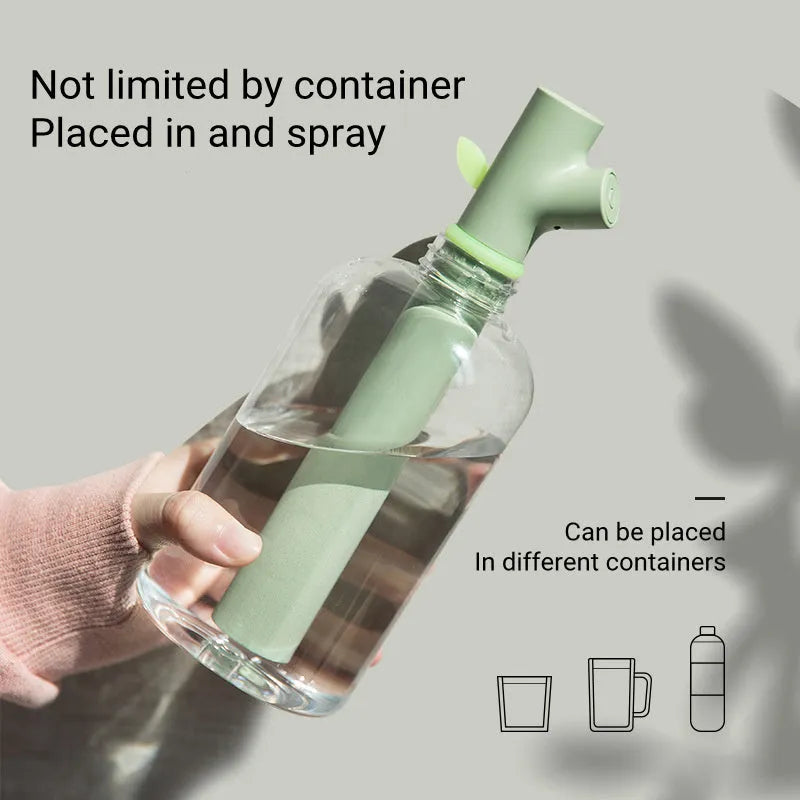 Transparent round portable USB ultrasonic cool mist humidifier on a desk