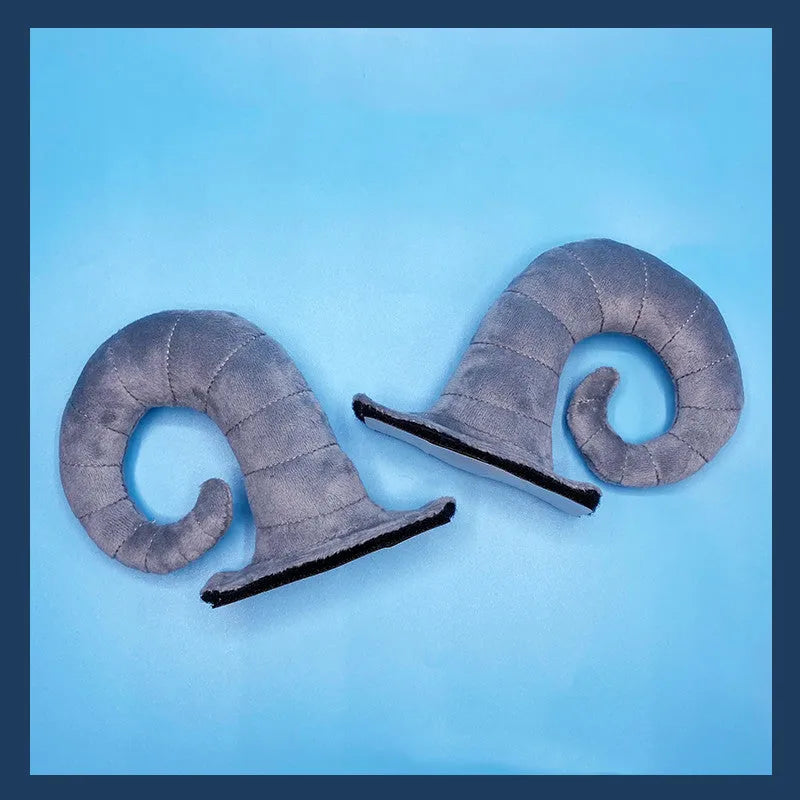 A pair of composite fibre demon horn ornaments for a motorcycle helmet in a chosen colour.