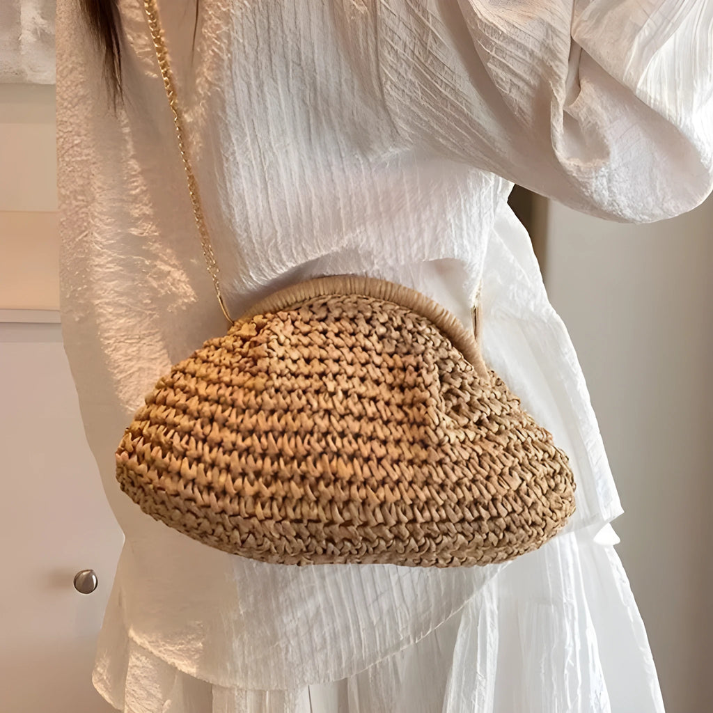 Women's straw beach shoulder bag in khaki colour with chain accent detail