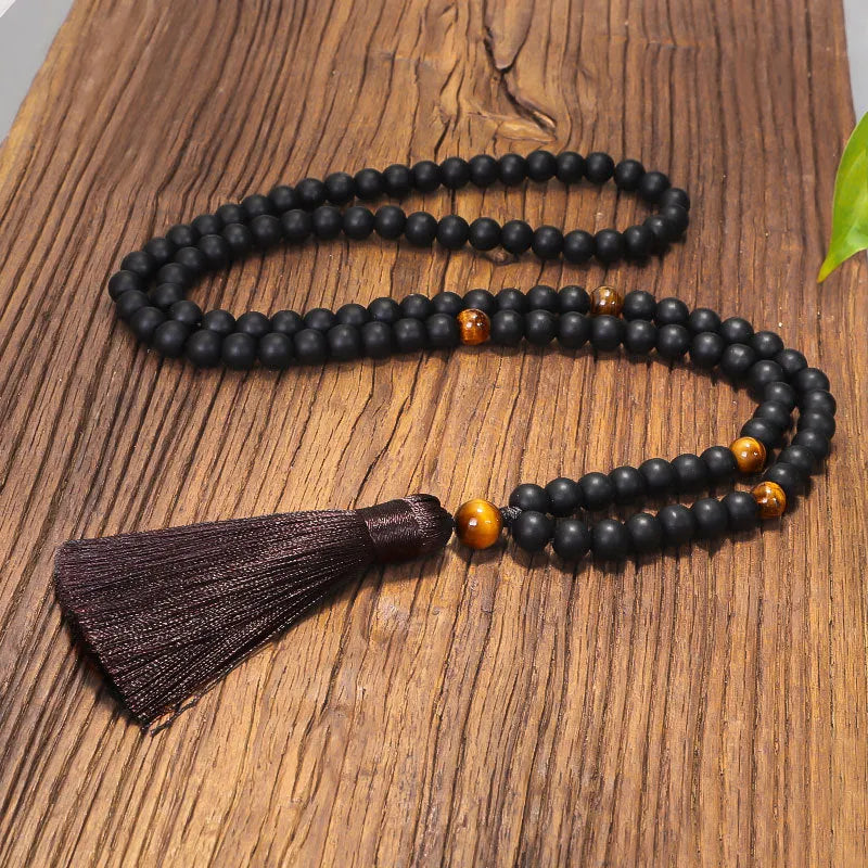 Tiger's eye stone beaded bracelet and necklace set with 108 beads and drop-shaped pendant
