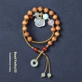 Women's hand-woven ebony bracelet with traditional ruyi pattern and double ring closure