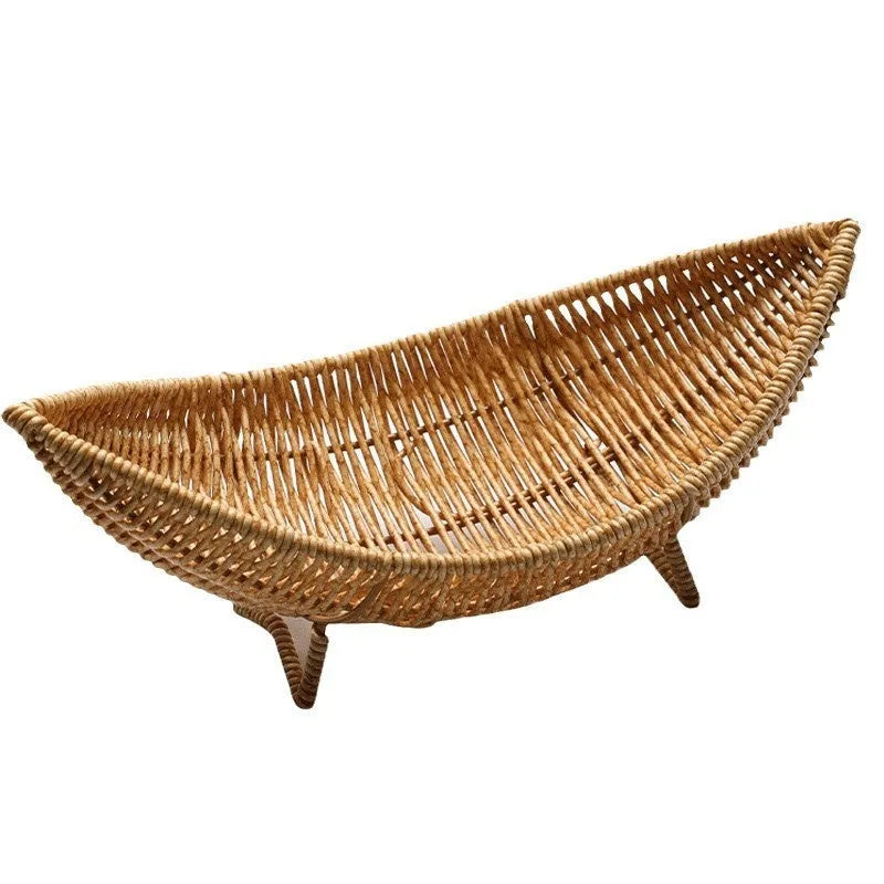 Plastic knitted basket fruit dim sum rack on a desktop with melon seeds and snacks