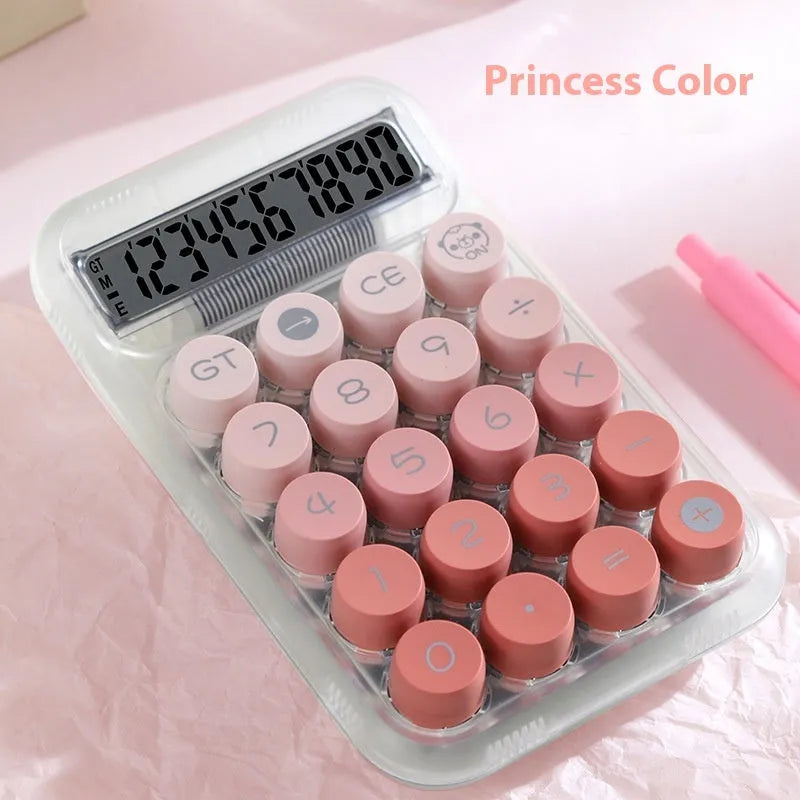 Round keypad gradient colour calculator in blue, green, pink, or purple on a desk.