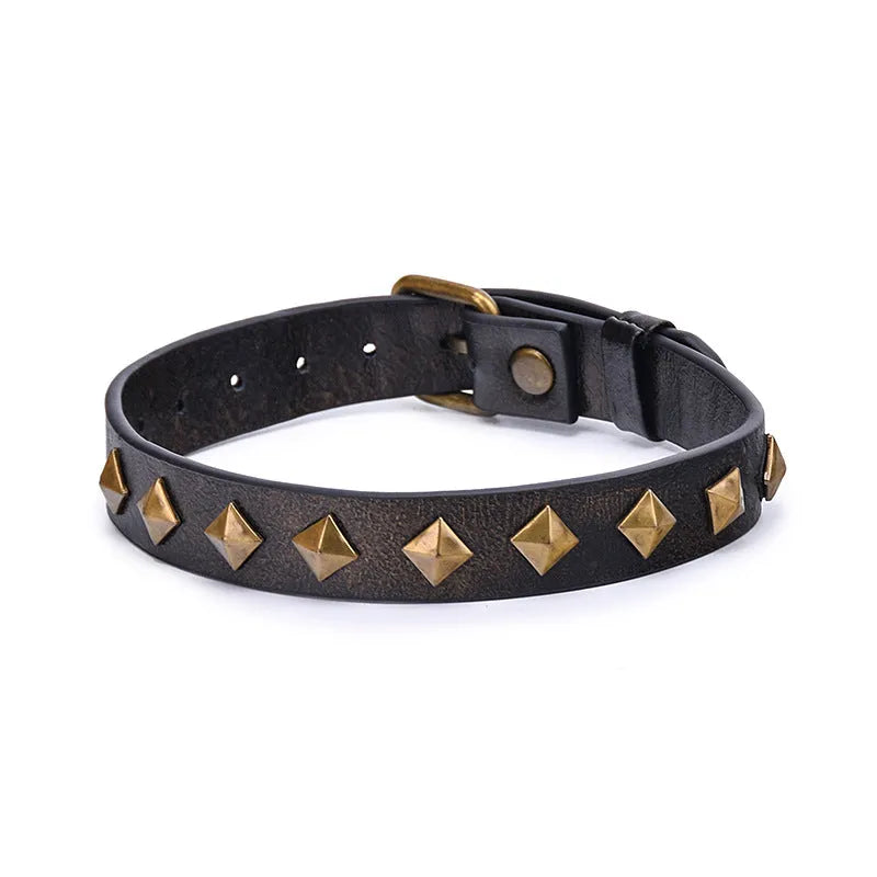 Bronze rivet cowhide leather punk collar with buckle closure on display