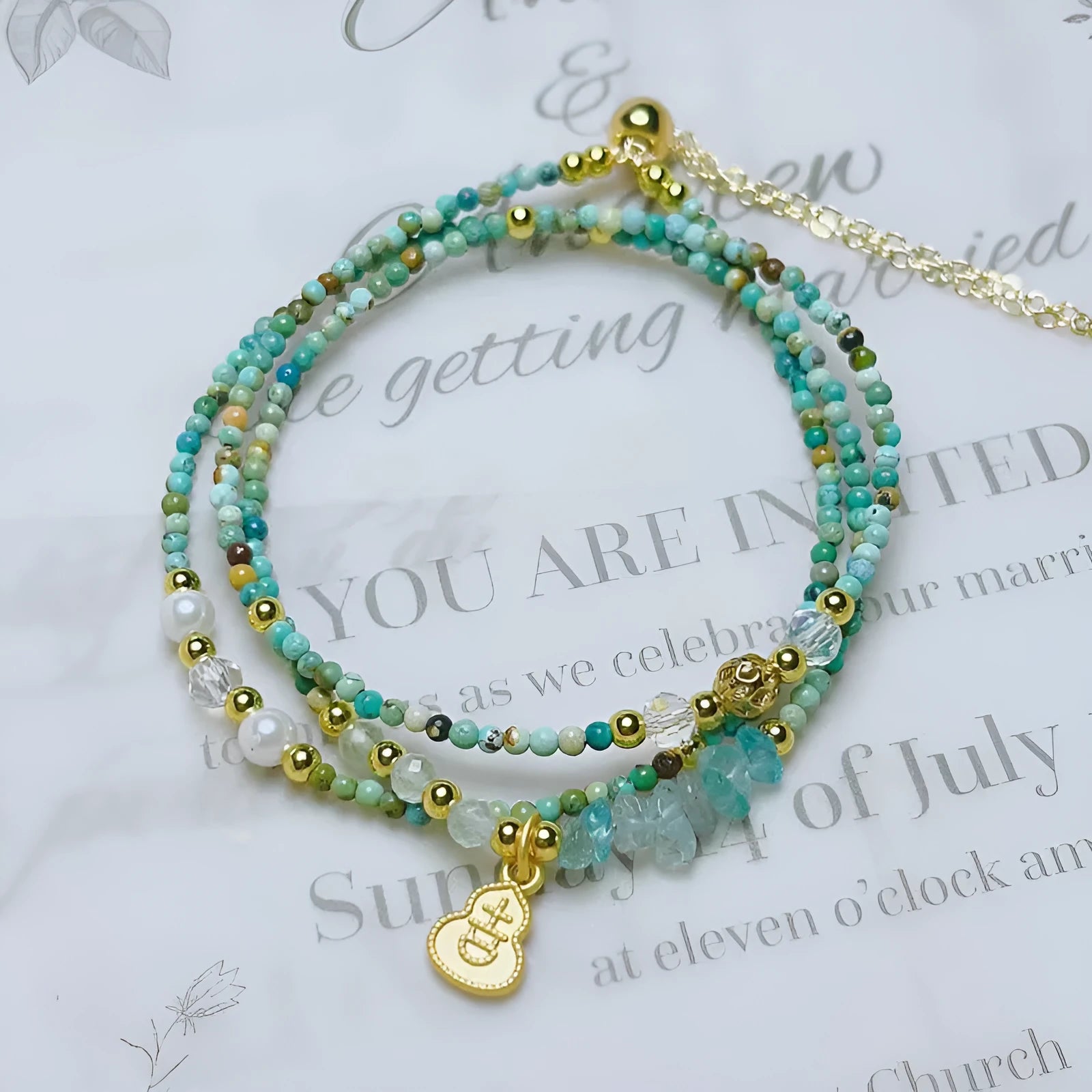 Turquoise round bead bracelet with a three-ring pull-out adjustable clasp in Korean style.