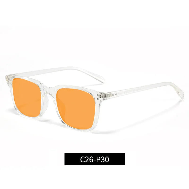 Colour-changing orange lens anti-blue light glasses with a TR90 frame on a colour box.