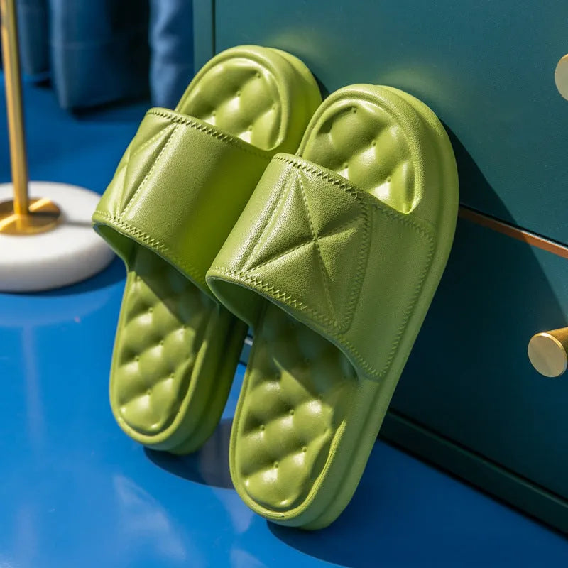 Pair of soft EVA non-slip bathroom slippers with a thick sole, shown in a choice of colours.