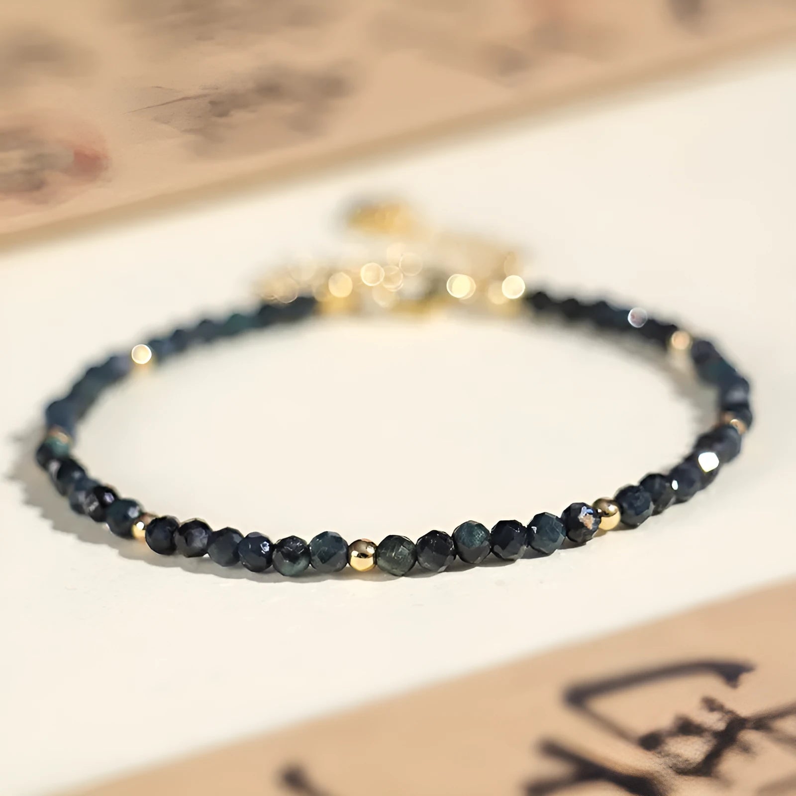 Blue tourmaline spacer bead bracelet with 3mm cut beads for women