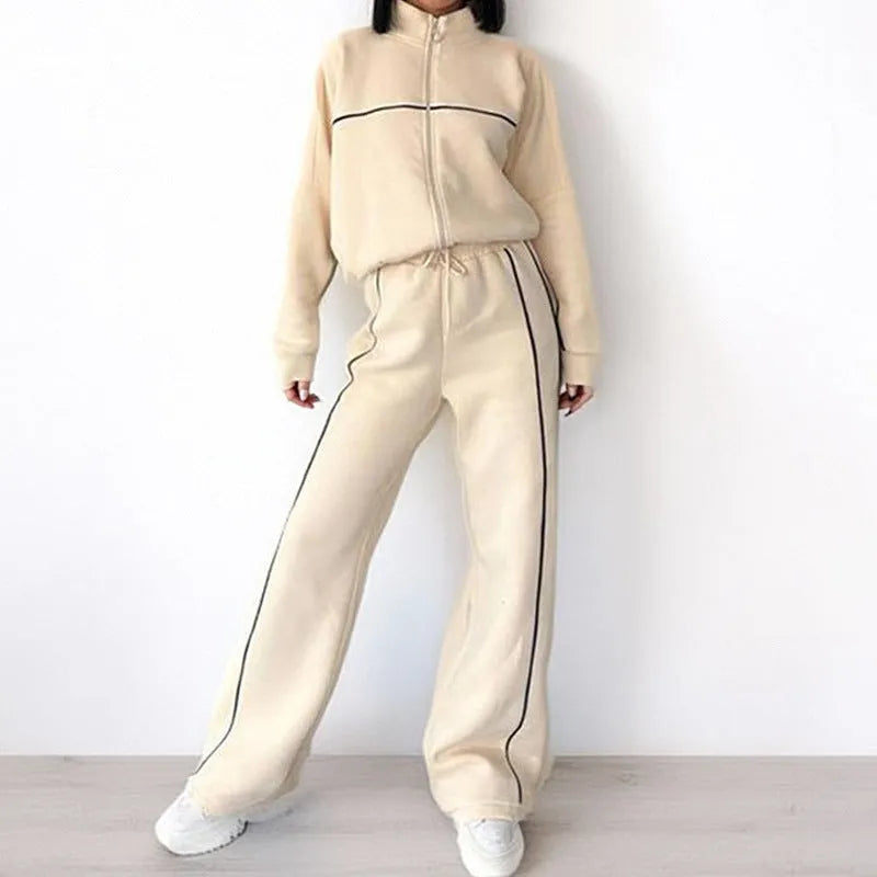 Two-piece striped casual suit with zip-front hoodie and matching trousers in various colours
