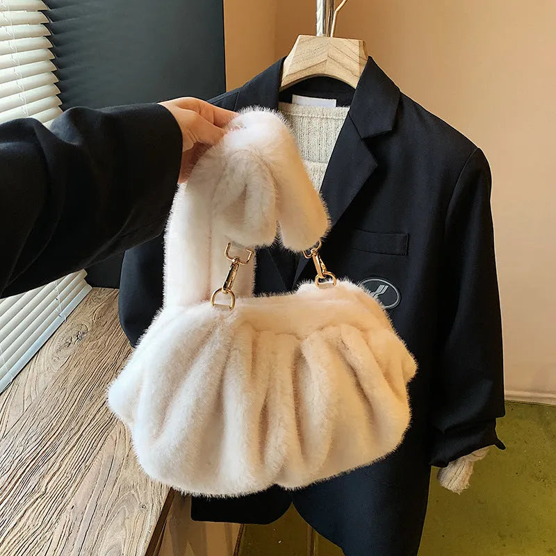 Pleated Cloud women's furry plush bucket handbag in white with stitching detail and shoulder strap