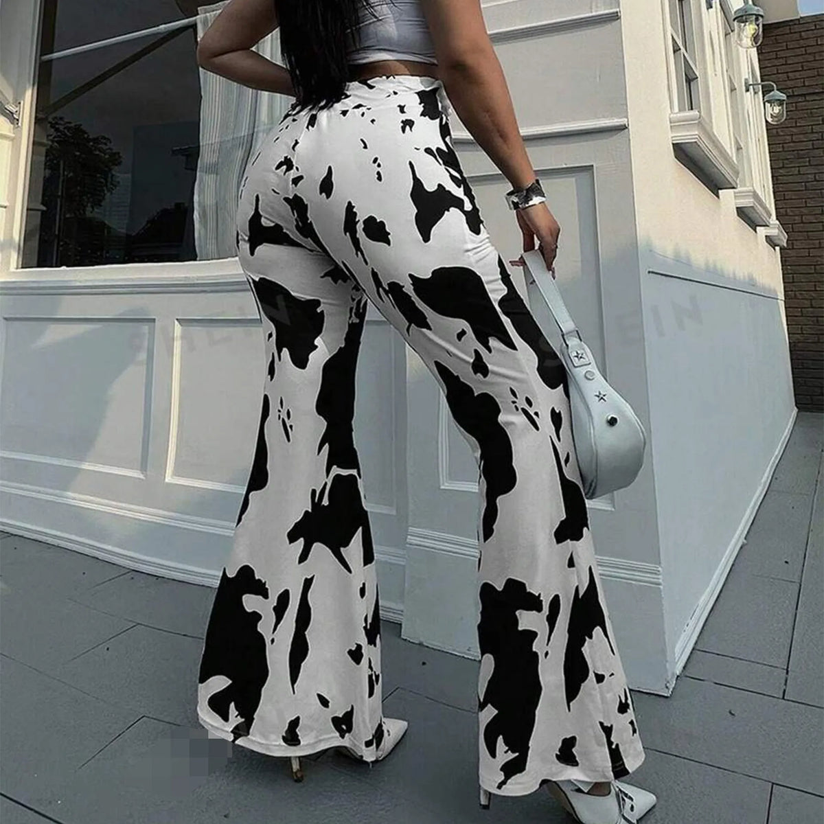 White cow print high-waisted flared pants for women full-length street fashion