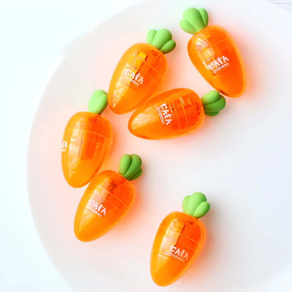 Carrot-shaped plastic pencil sharpener with 7cm handle in carrot colour