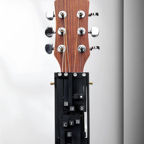Black automatic chord changing device for folk guitar practice with singers