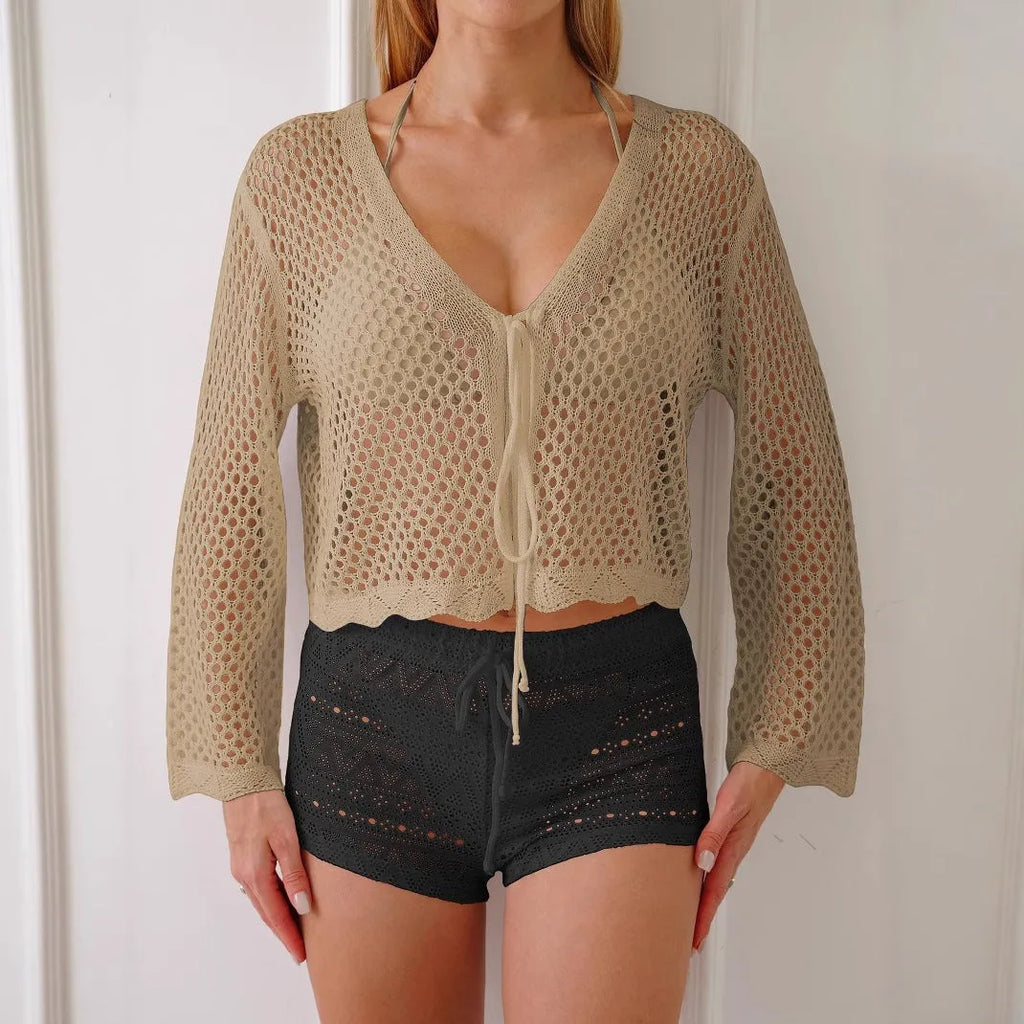 Women's hollow woven cardigan blouse with bell sleeves in apricot colour showing short 40cm length