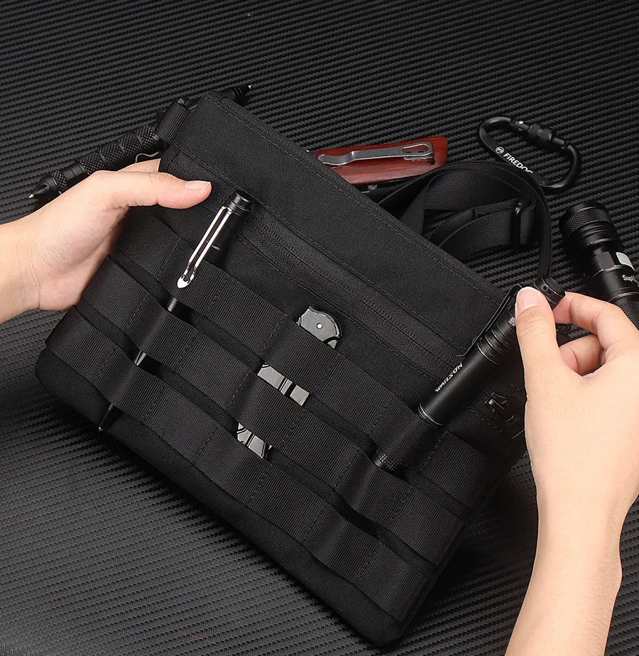 Black Oxford cloth portable outdoor organiser kit measuring 18 by 3.5 centimetres