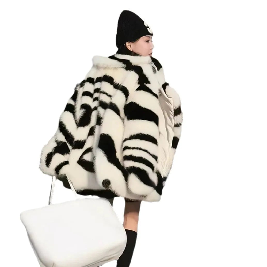 Women's zebra stripe fur top with long sleeves and skimmer collar, medium length animal print casual wear