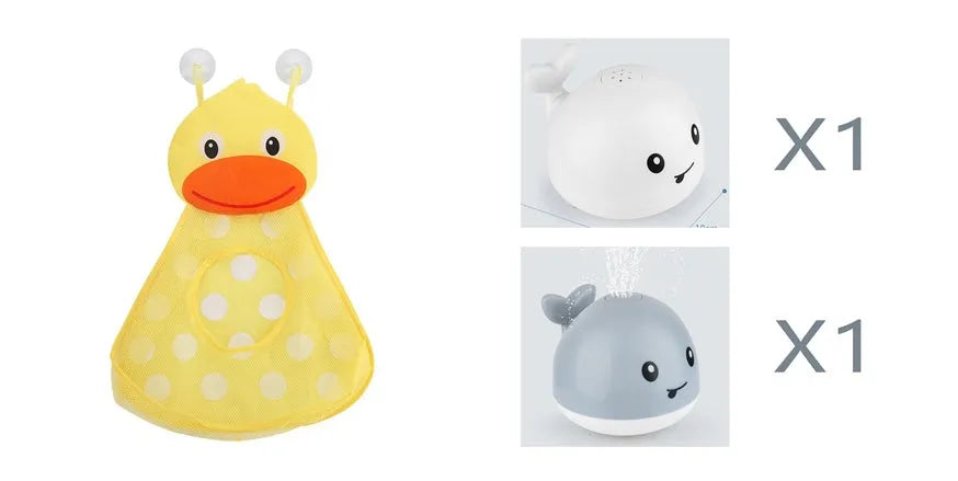 White and blue whale-shaped bath toy spraying water with LED lights on, floating in a baby bath