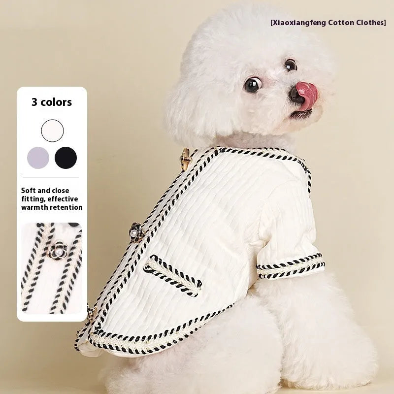 Cartoon-style quilted dog coat in light purple on a small dog.
