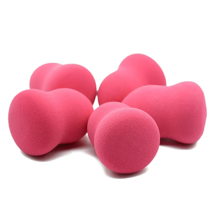 Pink non-latex makeup sponge for foundation application measuring 4x4x5.6 cm