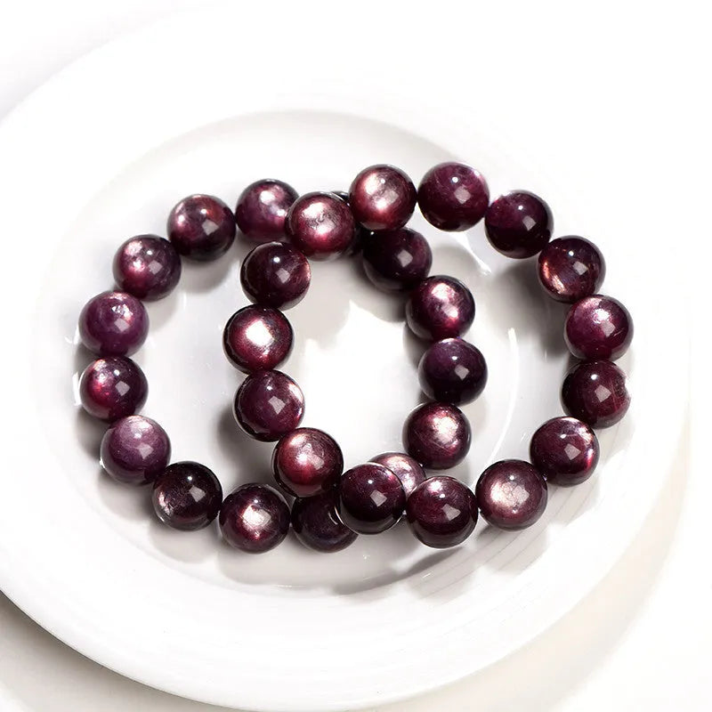 Purple lepidolite crystal round bead bracelet showing polished geometry beads in natural mineral colour