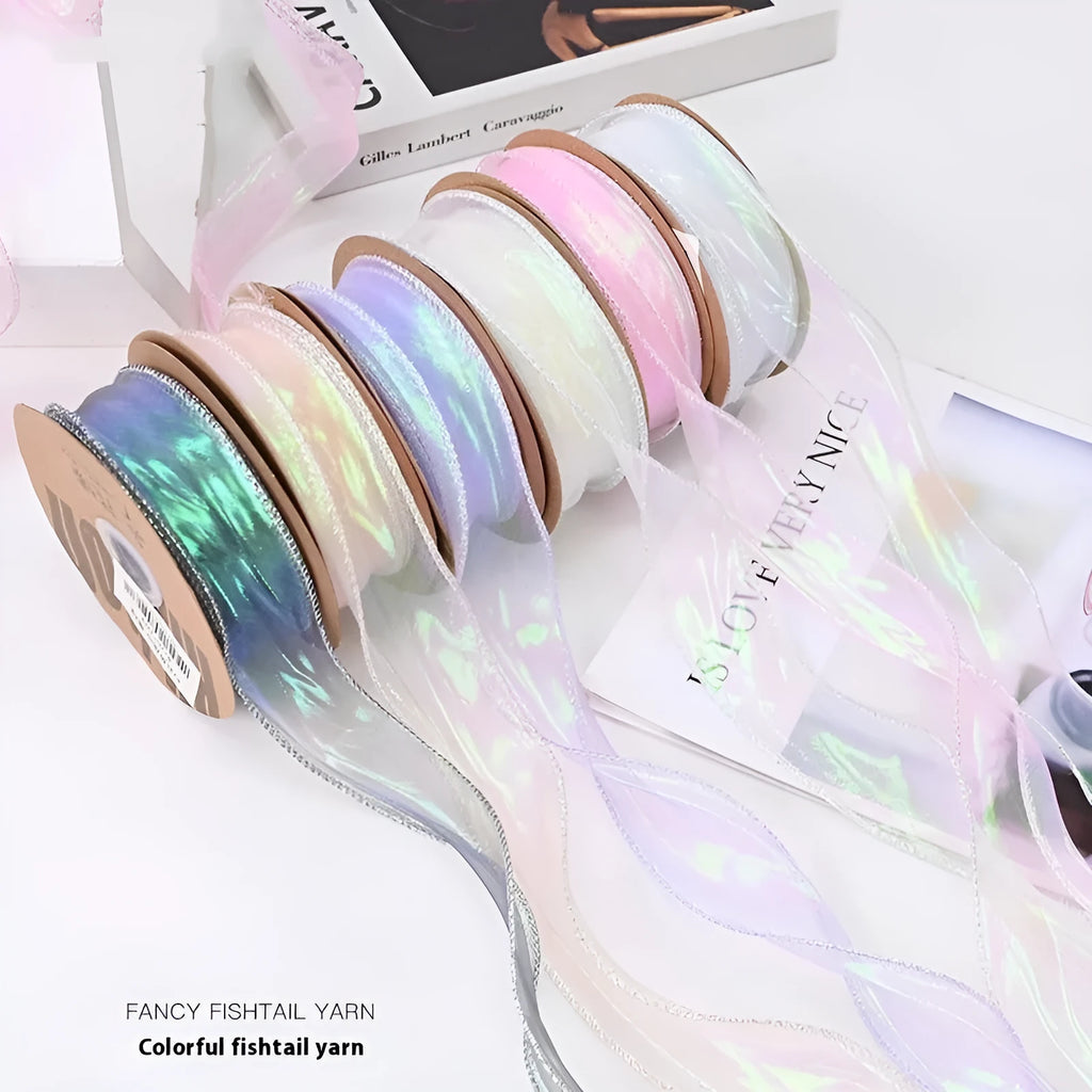 Roll of colourful fishtail yarn mesh decorative ribbon showing wave texture and multiple colour options