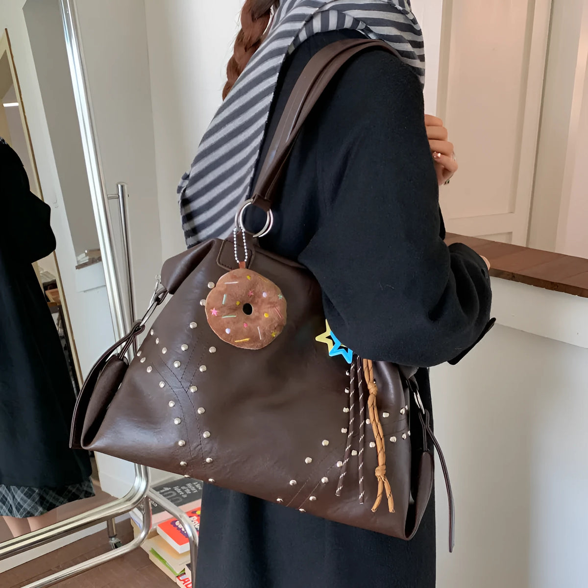 Fengtuote commuter underarm bag in PU leather, horizontal square shape, black colour, with rivet details and double shoulder straps