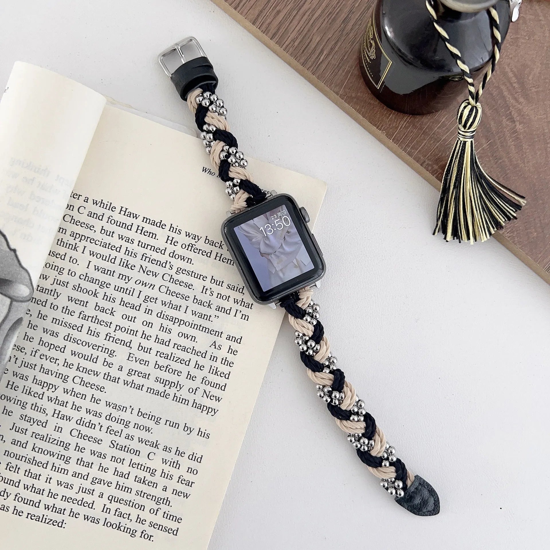 Grey elastic steel ball chain watch strap on wrist compatible with Apple Watch 38mm to 45mm