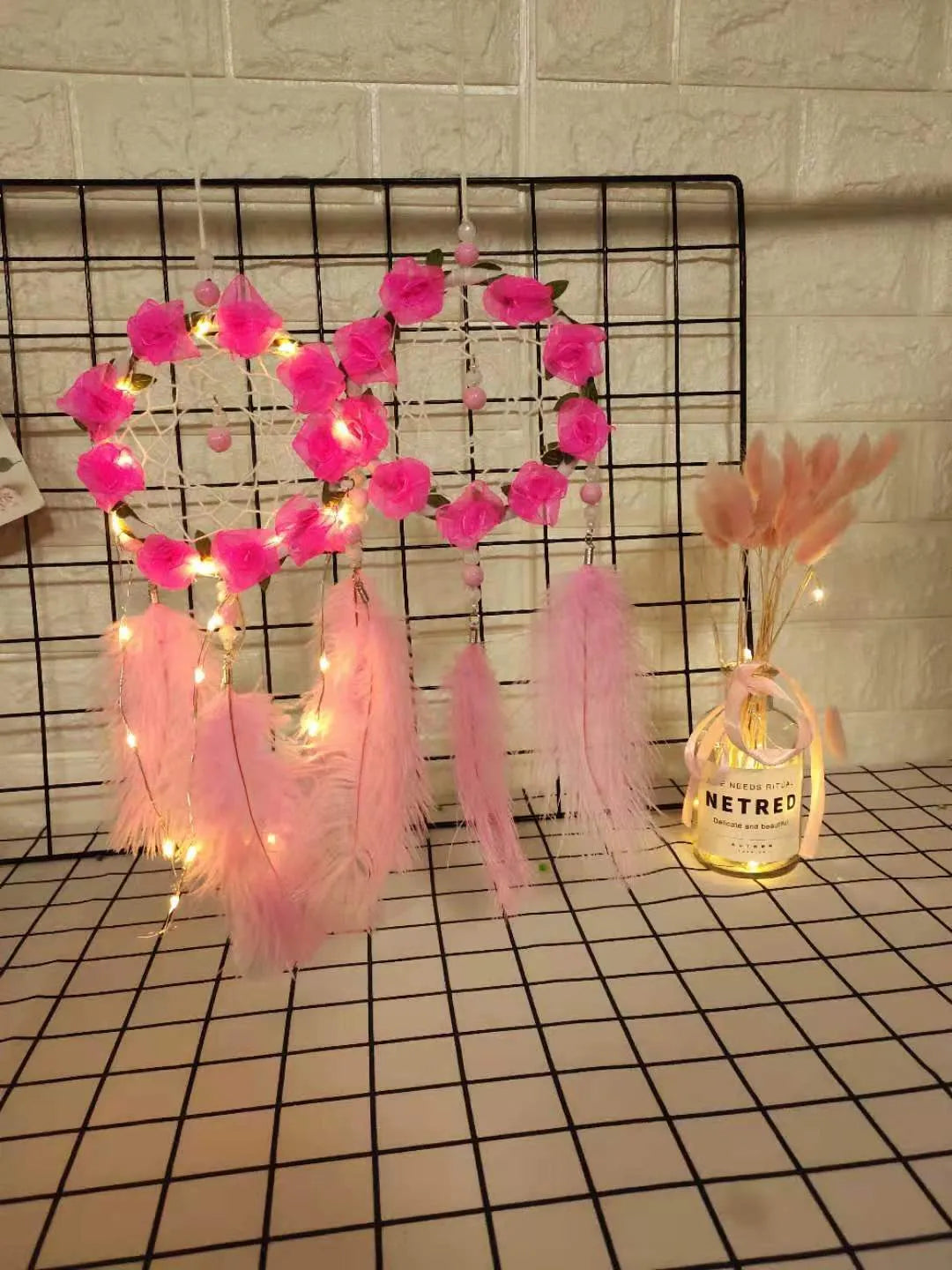 Pink dreamcatcher wind chime wall ornament with ostrich feathers, 10cm diameter