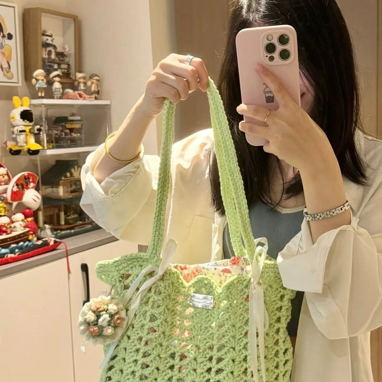 Hand-woven wool summer bag with floral pattern and secure closure