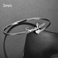 Customised name bracelet in stainless steel with silver finish and 10mm width on display
