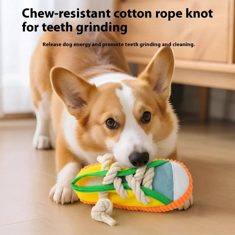 Plastic dog toy shaped like slippers in yellow, black, or blue, designed for chewing and making sound.