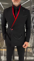 Fake double-layered black jacket with red inside and chain detail worn as streetwear
