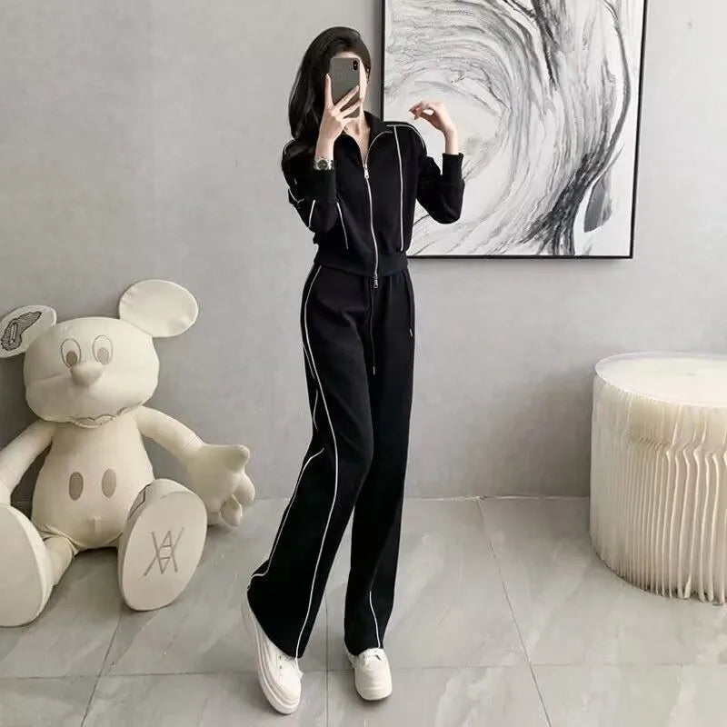 Women's casual two-piece set in white with short zipper sweater and wide leg trousers, polyester fabric, collage stitching
