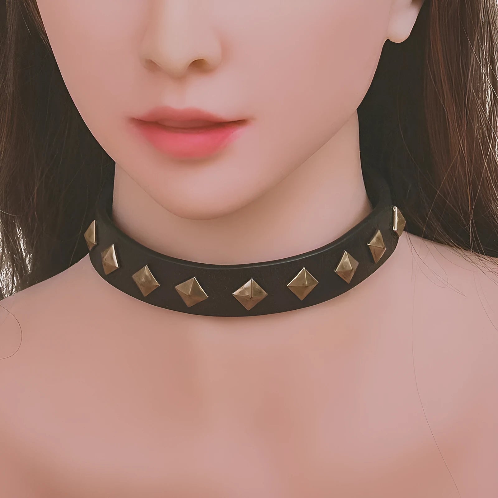 Bronze rivet cowhide leather punk collar with buckle closure on display