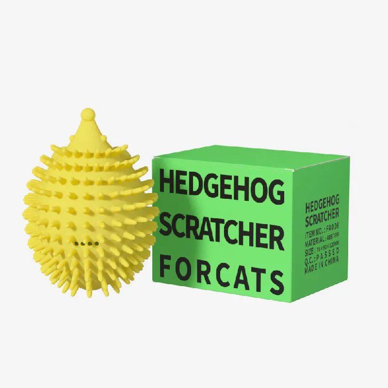 Green plastic cat corner scratcher with a cat teaser stick placed on a wooden floor