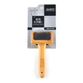 Pet grooming bamboo wood air cushion needle comb with original bamboo colour handle and steel pins on a clean background