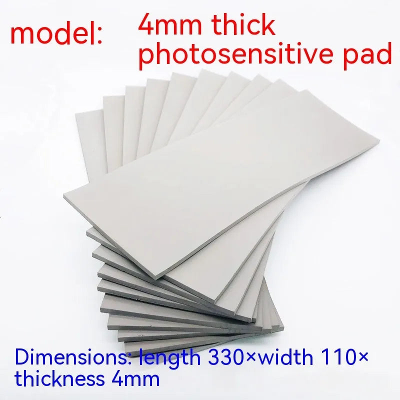 Black and grey plastic light-sensitive craft mat for seal making, showing 7mm, 4mm and 2mm thickness options.