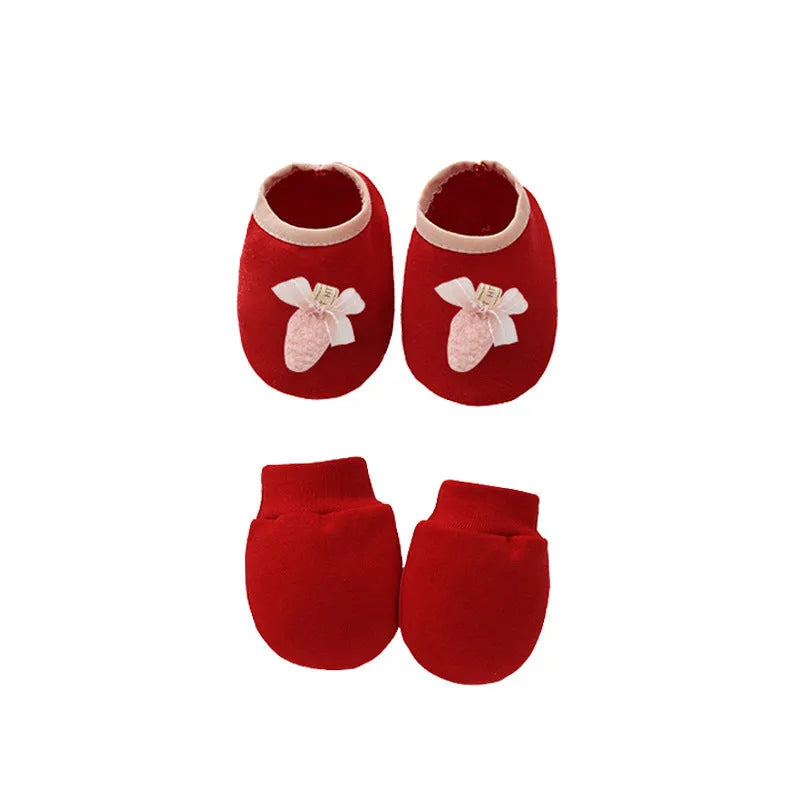 Cotton baby gloves and foot cover set in multiple colours including light blue, navy blue, pink, and camel