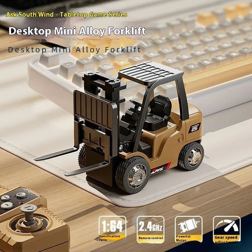 Mini alloy remote control forklift model with cargo pallet and hook on a table.