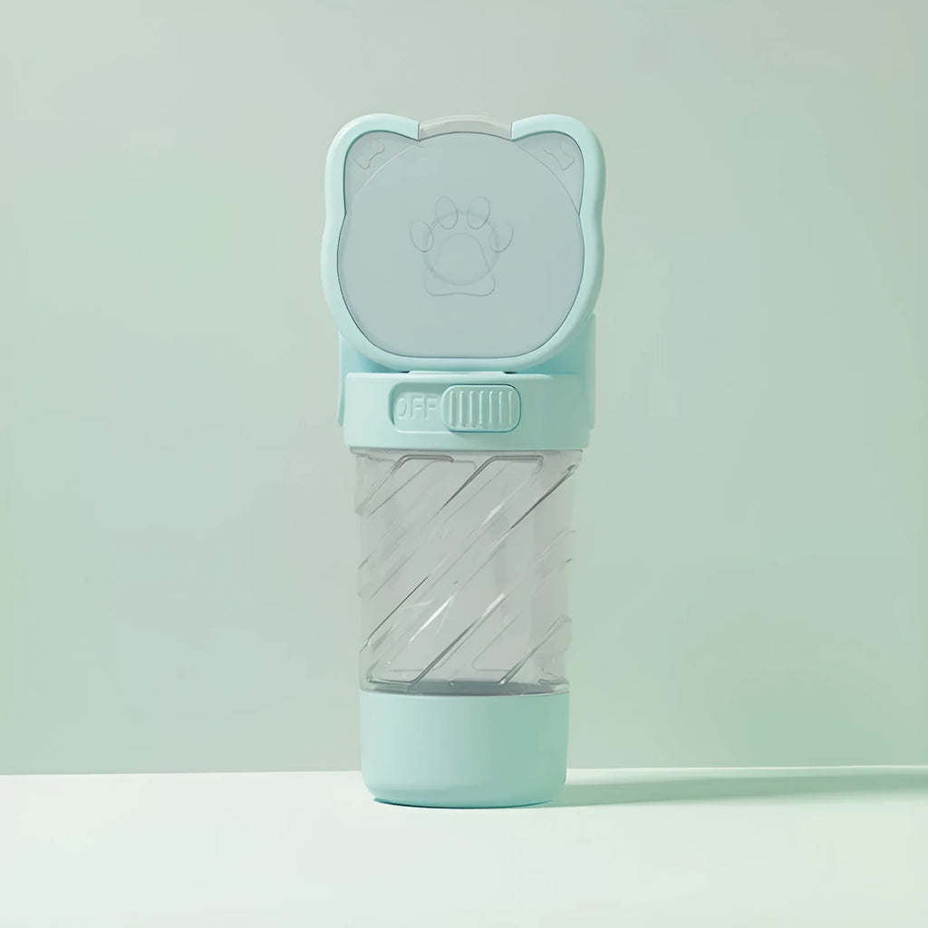 Green 3-in-1 pet water bottle with food container and waste bag dispenser, showing carrying strap.