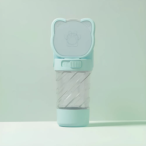 Green 3-in-1 pet water bottle with food container and waste bag dispenser, showing carrying strap.