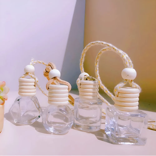Glass car perfume pendant fragrance showing cylinder, diamond, flat drum and square container style options