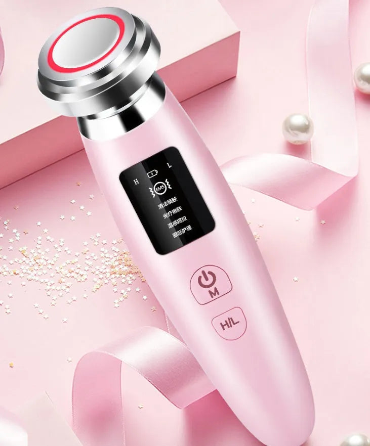 Pink cleansing and rejuvenating beauty instrument showing 185mm length