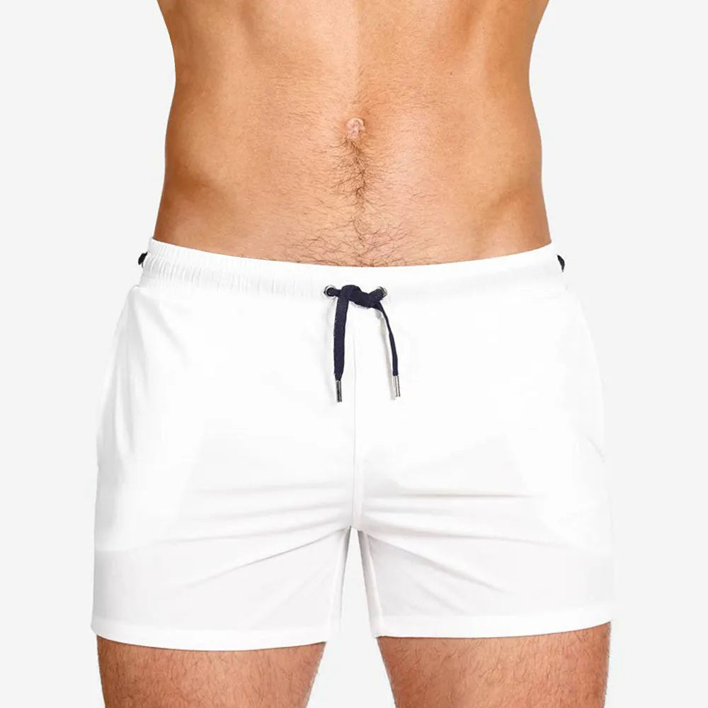 Mesh lining swimming sports shorts in polyester fabric showing solid colour options