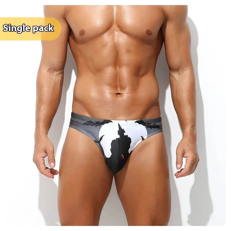 Men's low-waisted quick-drying briefs with digital print design on polyester fabric.