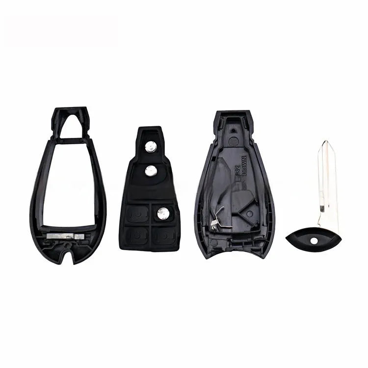 Blank Dodge car key shell case made of black ABS plastic, showing brass contacts inside, dimensions 85x42x15mm.