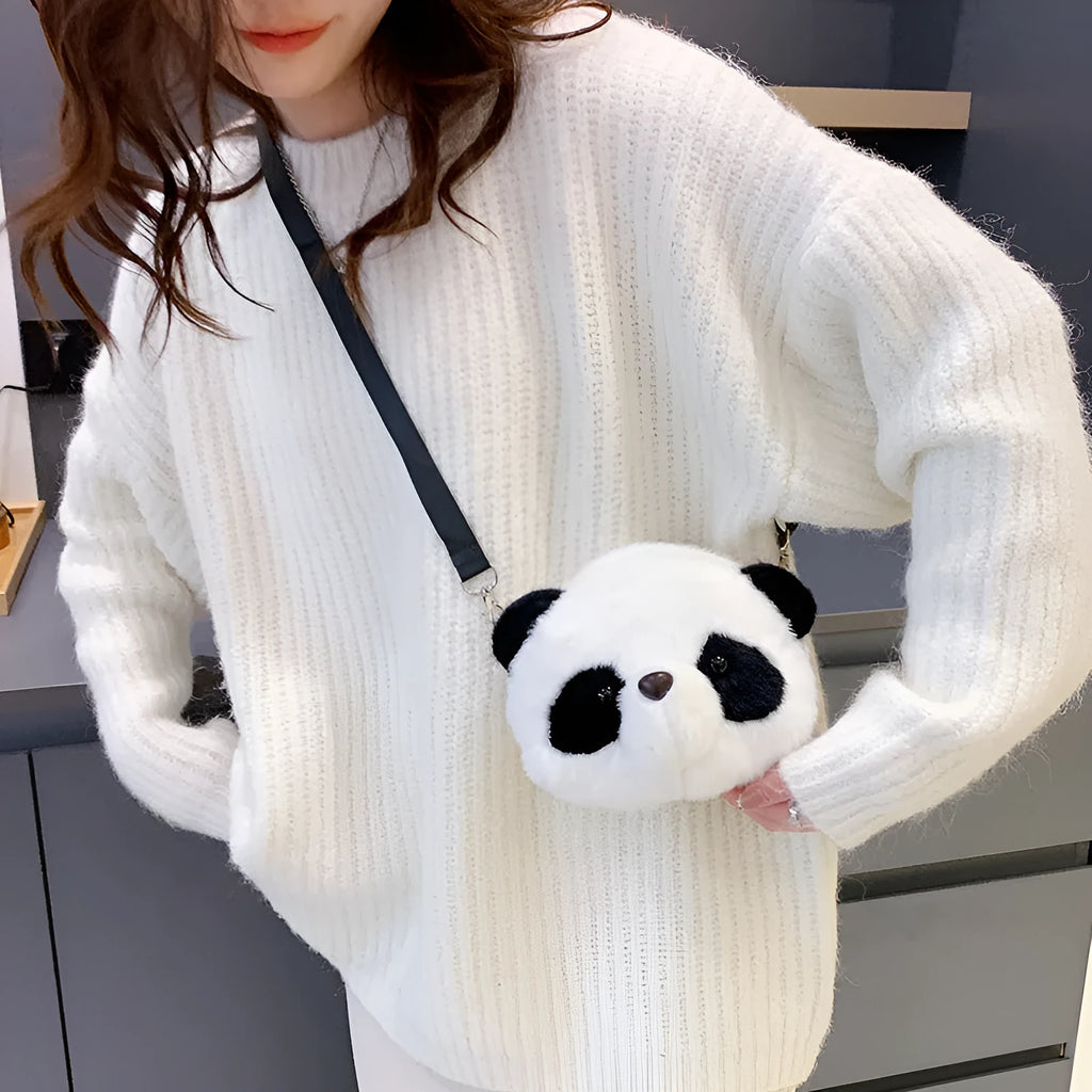 Soft plush cylindrical panda head crossbody bag with sandwich pocket.