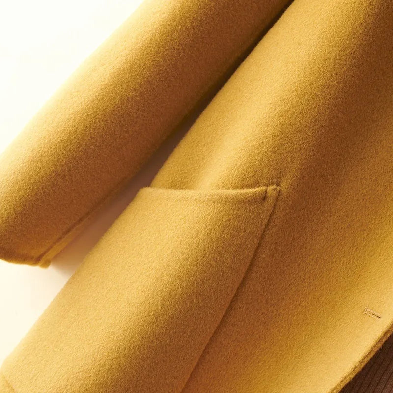 Women's wool mid-length coat with doll collar and pearl buckle in solid colour options